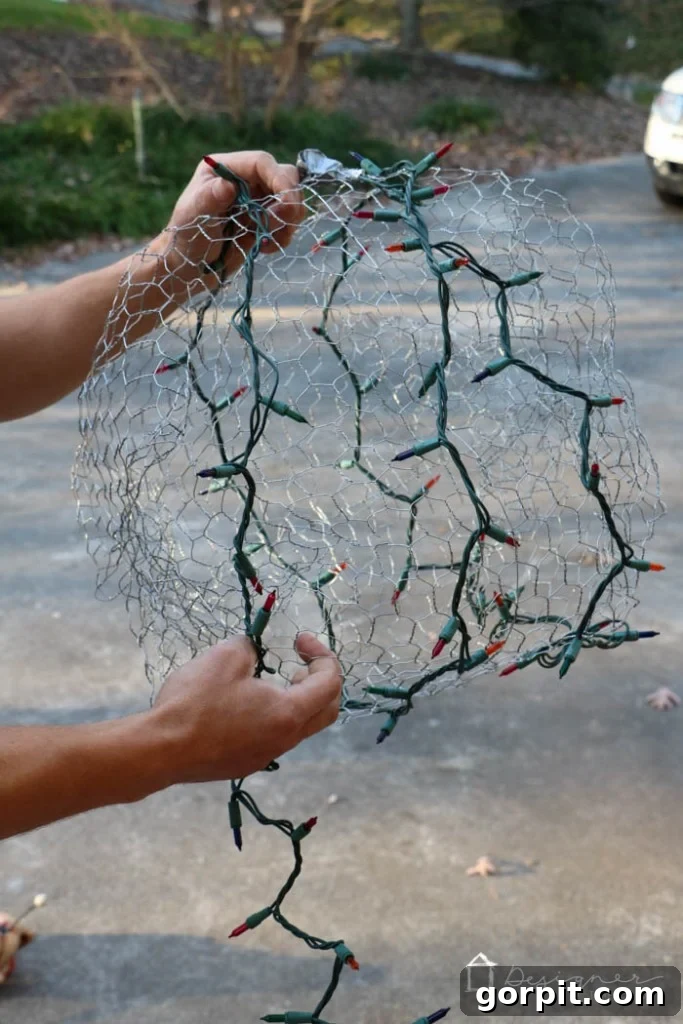 Create stunning DIY lighted Christmas balls for a festive home. Follow our tutorial for crafting outdoor Christmas decorations that shine bright.