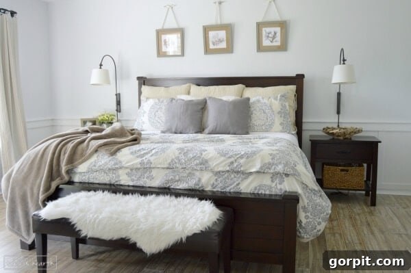 Soothing and serene master bedroom makeover by Table + Hearth, balancing delicate textures, patterns, and soft colors for ultimate relaxation.