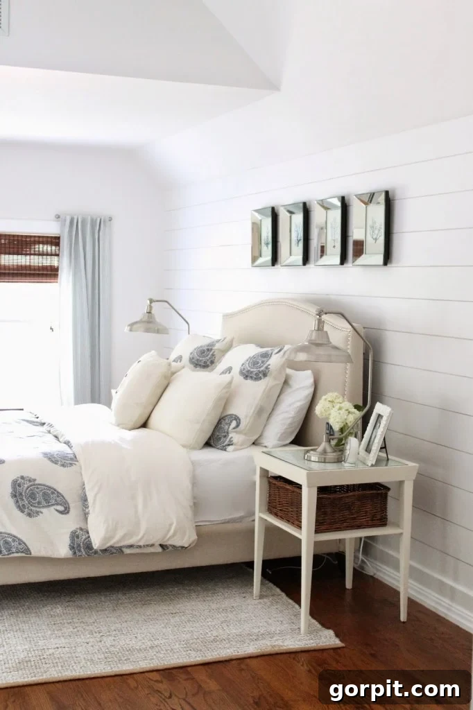 Bright, crisp, and serene master bedroom makeover by The Picket Fence Projects, featuring resourceful garage sale finds and inspiring DIY projects.
