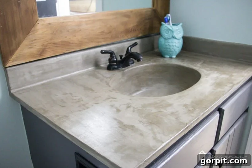 Present-day view of the DIY concrete sink, showcasing its durability and aesthetic appeal.