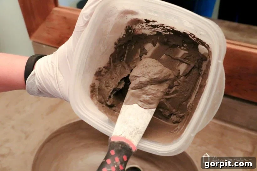 Step 4: Mixing Ardex Feather Finish to a pudding-like consistency for the repair.