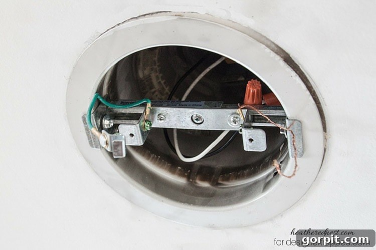 Understanding the ground wires: green for the kit, bare copper for the new pendant light.