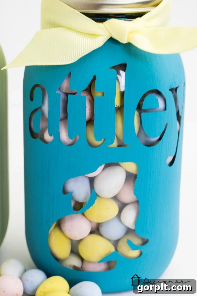 A collection of personalized mason jars, showcasing the ease and cuteness of this DIY gift idea for any special event.