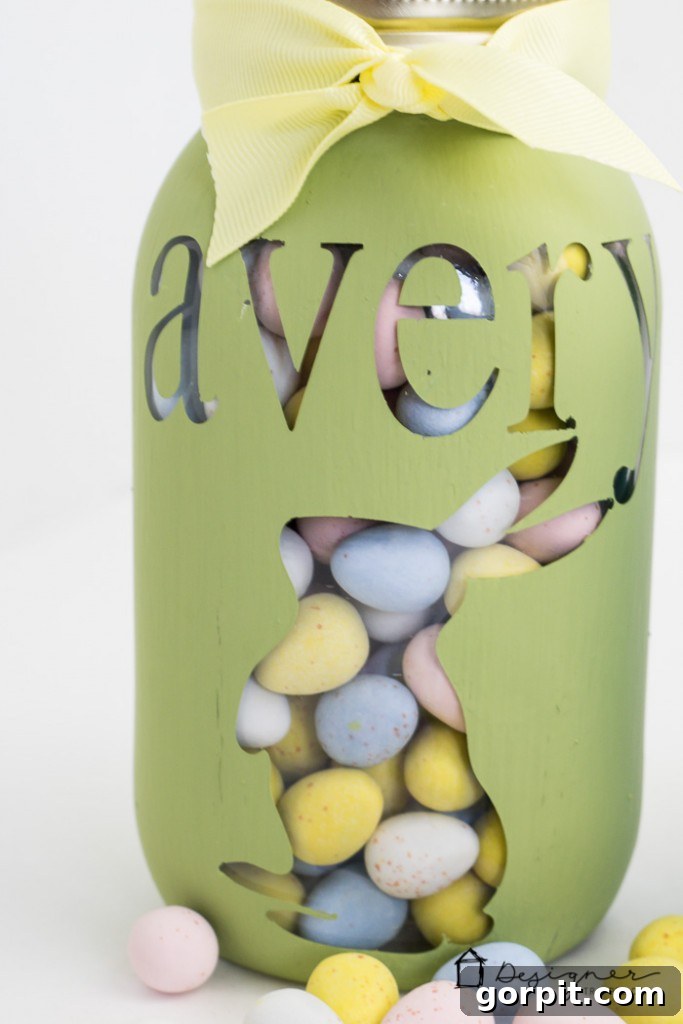 Detail shot of a personalized mason jar, emphasizing the clean lines and professional finish achievable with this DIY tutorial.