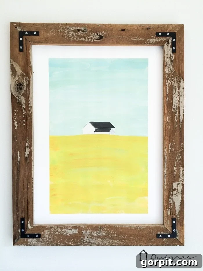 Finished DIY framed picture made from reclaimed wood, showcasing rustic charm.
