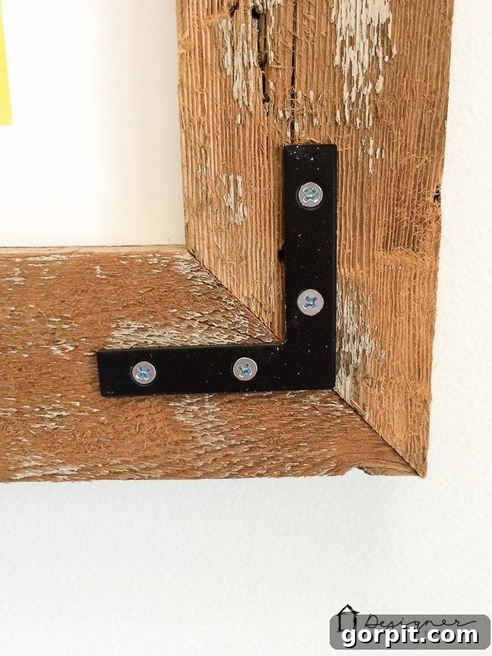 Close-up of the rustic wood grain on a DIY picture frame.