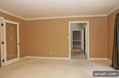 Another view of the uninspiring 'before' room, showing carpet and dated trim