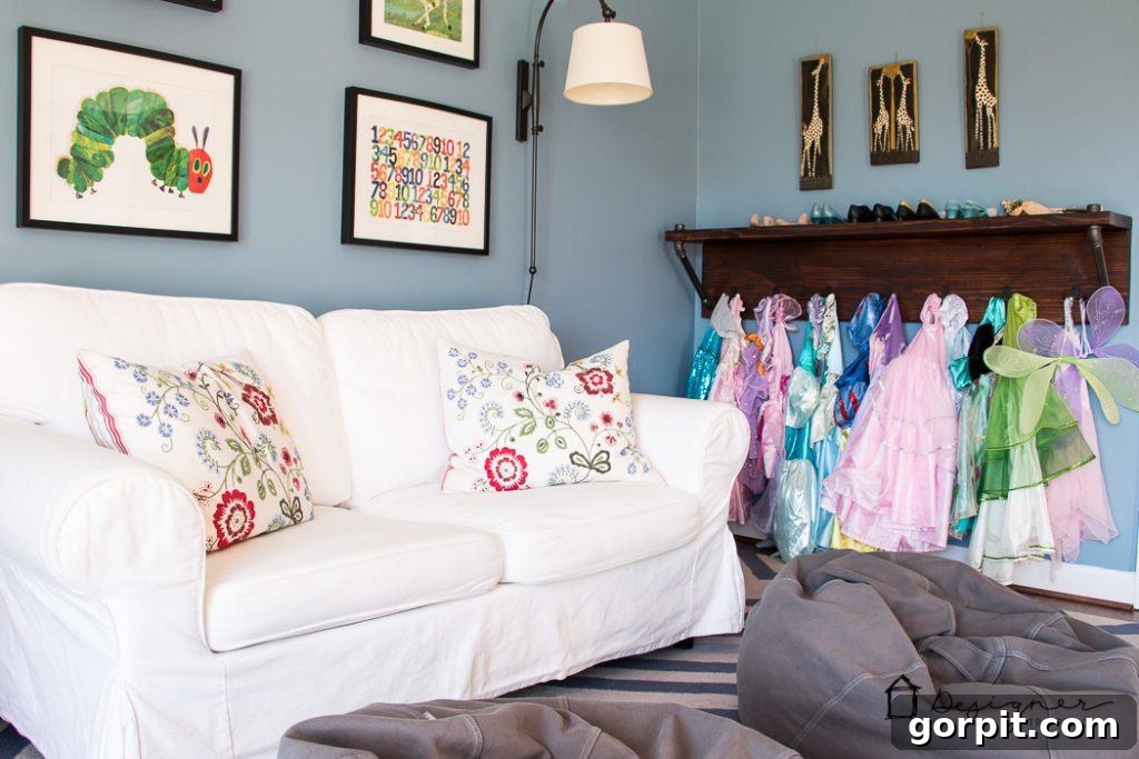 Corner view of the kids' playroom showcasing functional playroom storage solutions with colorful bins and accessible shelving for toys and books.