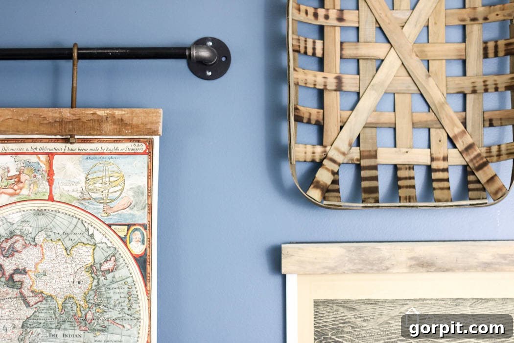 Close-up of a North Carolina tobacco basket adding rustic texture and historical appeal above a beautifully framed map, complementing the reclaimed wood picture frame aesthetic.