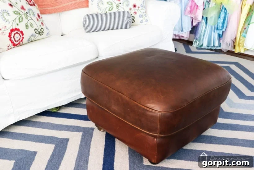 Breathe New Life into Your Leather Furniture 11 restored leather ottoman as part of a cozy reading nook