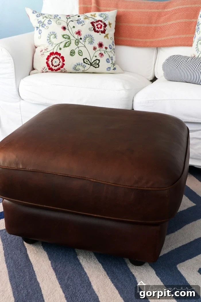 Breathe New Life into Your Leather Furniture 10 restored leather ottoman close up in playroom setting