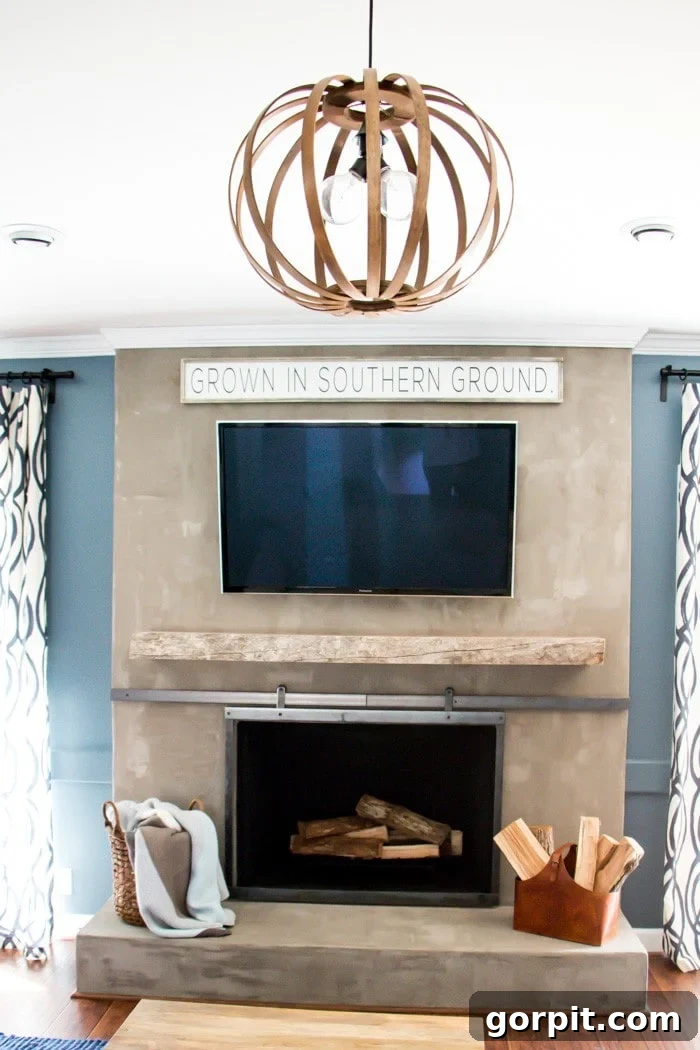 Close-up of the sliding barn door fireplace screen details, showcasing the craftsmanship.