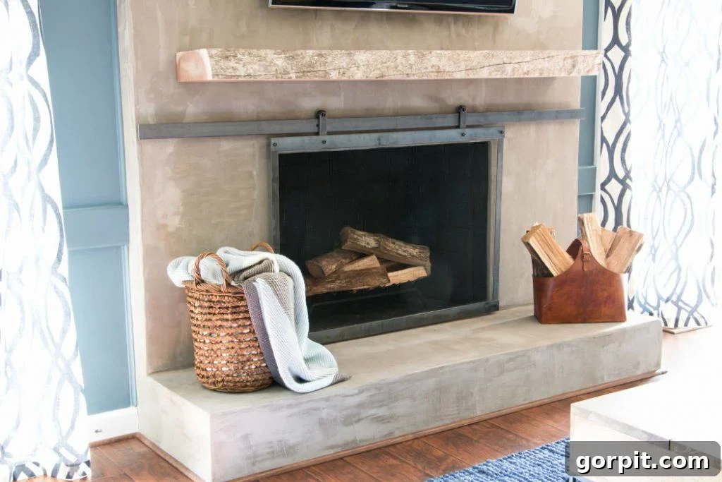 Barn door fireplace screen in an active living room, showing its functional beauty.
