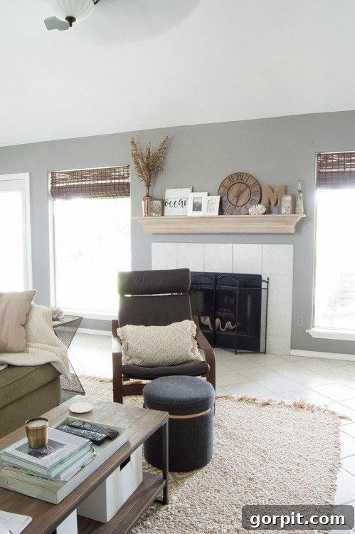 Wow! Check out this DIY fireplace mantel update made from simple molding. Love the driftwood finish! 