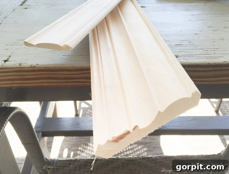 Wow! Check out this DIY fireplace mantel update made from simple molding. Love the driftwood finish! 
