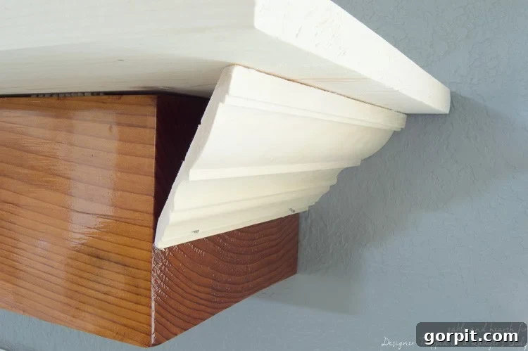 Wow! Check out this DIY fireplace mantel update made from simple molding. Love the driftwood finish! 