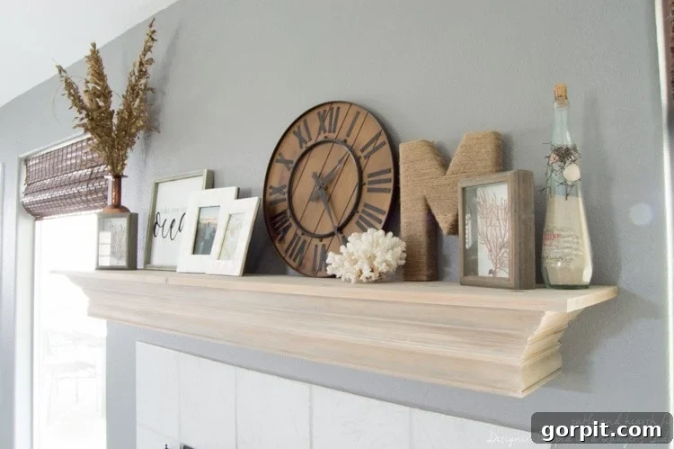 Wow! Check out this DIY fireplace mantel update made from simple molding. Love the driftwood finish! 