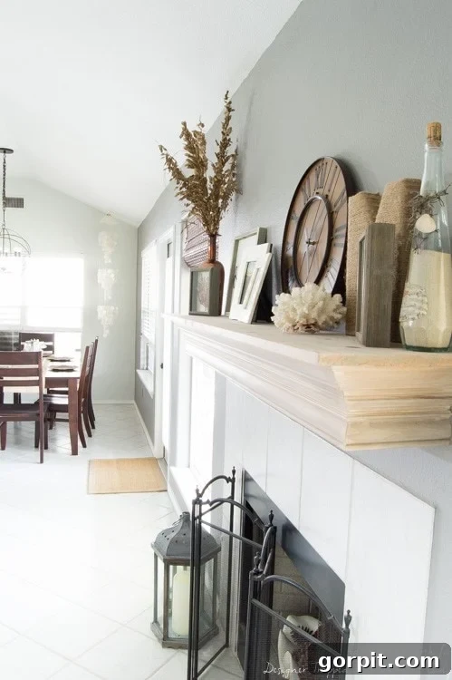 Wow! Check out this DIY fireplace mantel update made from simple molding. Love the driftwood finish! 