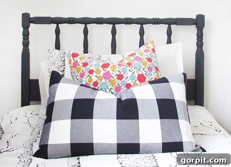 Sew Your Own Zippered Pillow Cover 17 DIY zippered pillow covers are neatly arranged on a twin bed in a girl's bedroom, adding a personalized touch to the decor.