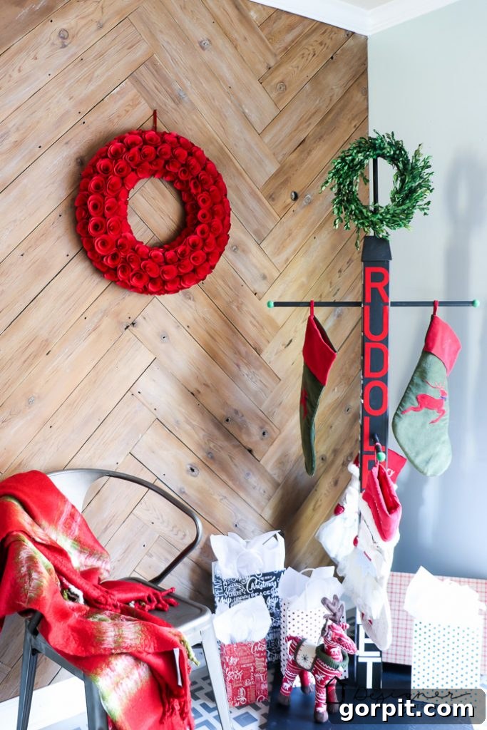 Finished DIY stocking holder stand displaying various Christmas stockings indoors