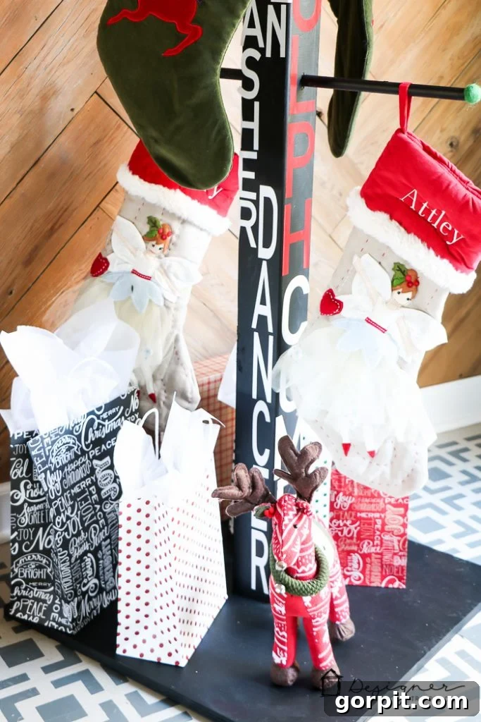 Detailed view of the decorated DIY stocking holder stand with Christmas stockings