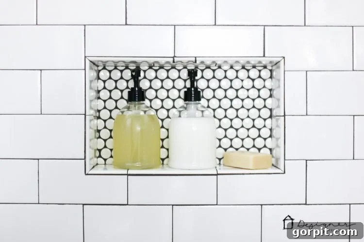 Practical and stylish pump dispensers for kids' shower products in a renovated bathroom.