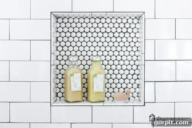 Modern and minimalist shower fixtures in a newly tiled DIY bathroom.
