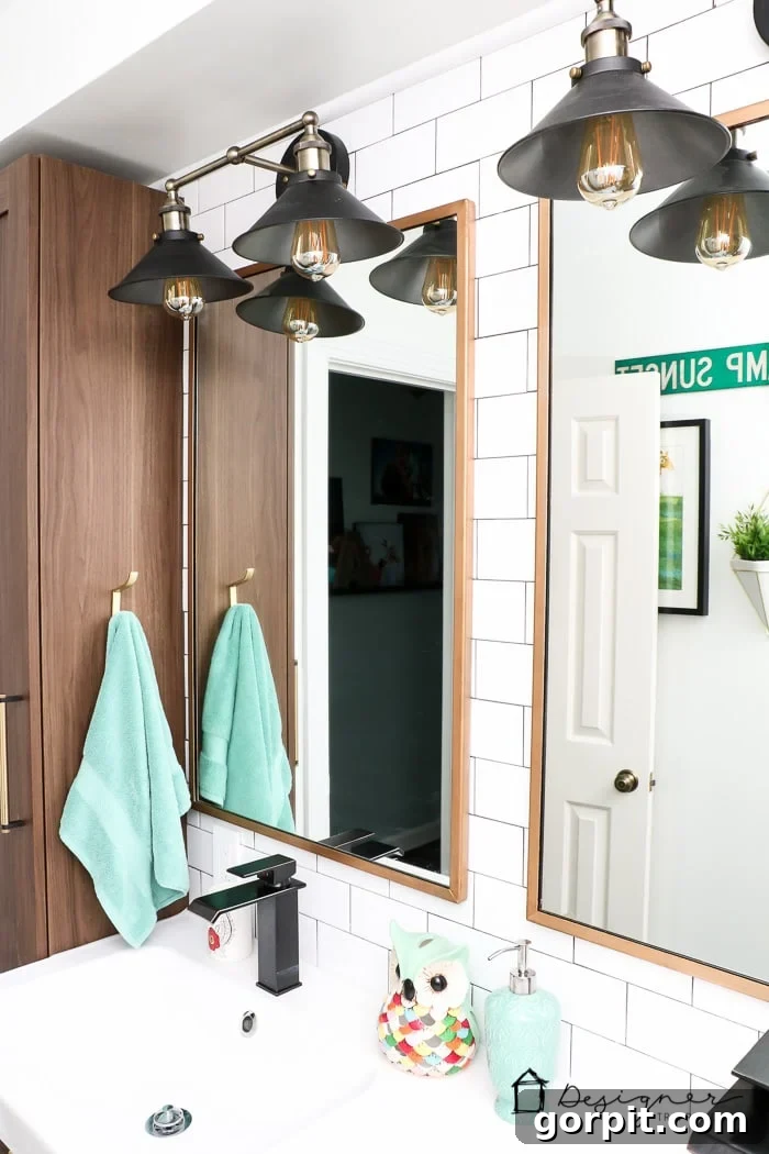 Modern bathroom fixtures and accessories with an emphasis on stylish lighting.
