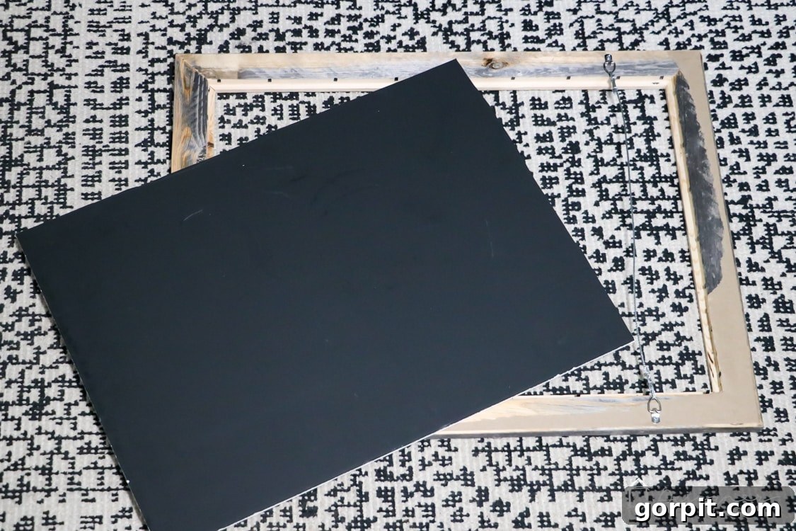 Close-up of DIY Christmas countdown calendar with chalkboard effect