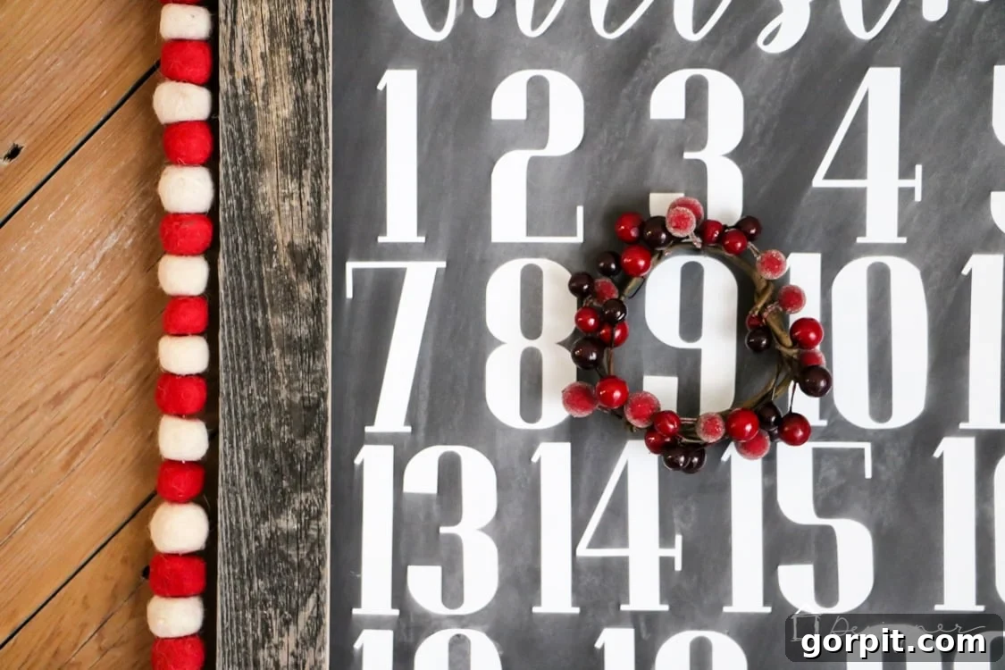 DIY Christmas countdown calendar with a handmade berry wreath marker