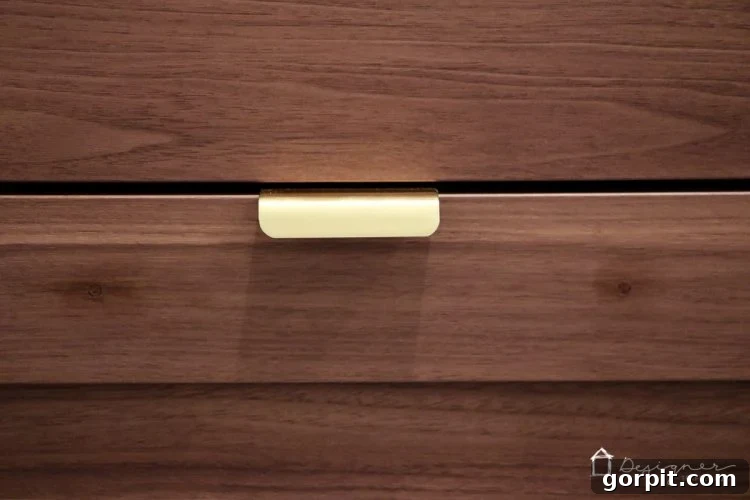 Unlock Ikea Cabinet Potential: Bypass Pre-Drilled Door and Drawer Holes 4 Close-up view of Ikea cabinet door after the hack, with pre-drilled holes seamlessly filled.