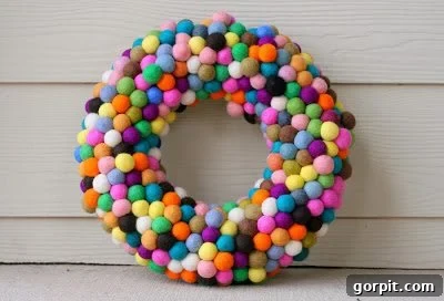 Colorful felt ball wreath for festive home decor