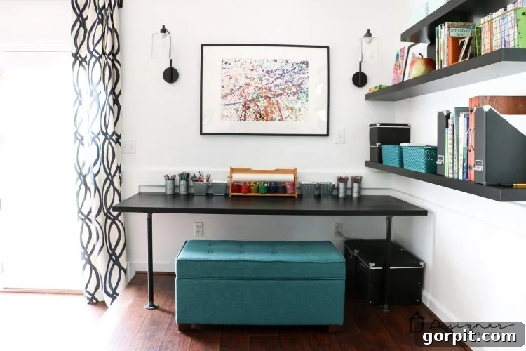 Effortless Pipe Desk DIY 16 A vibrant and organized playroom with the new DIY pipe desk, complete with art supplies and a cheerful atmosphere.