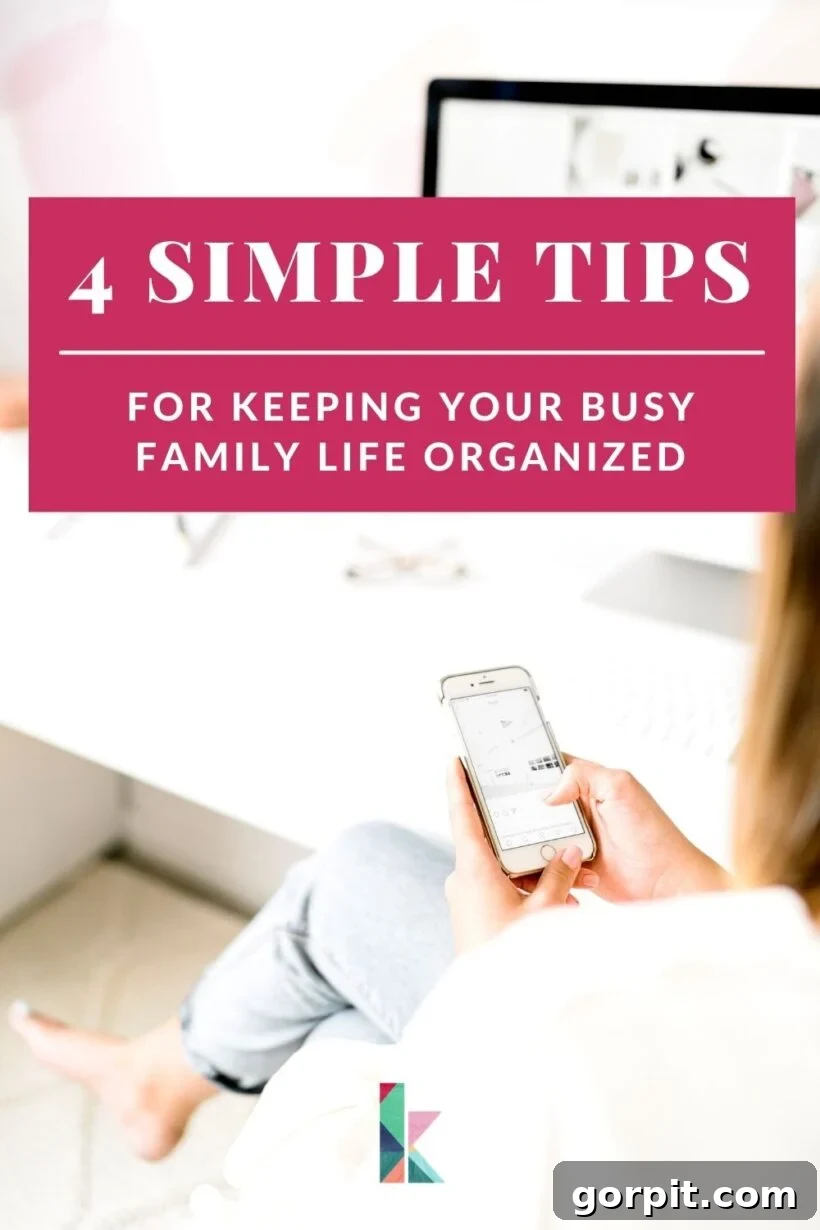 A woman looking at her phone, with the text "4 Simple Tips for Keeping Your Busy Family Life Organized"