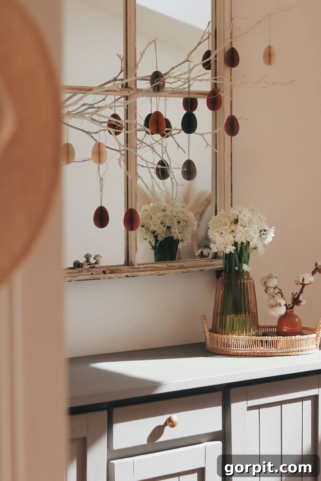 A contemporary Easter tree adorned with minimalist decorations, showcasing a chic and sophisticated approach to holiday decor.