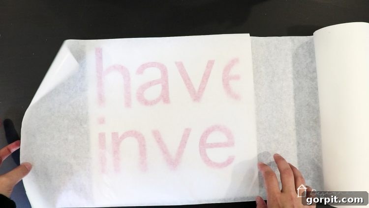 Transfer your weeded vinyl design onto transfer tape for easy application to the wall.