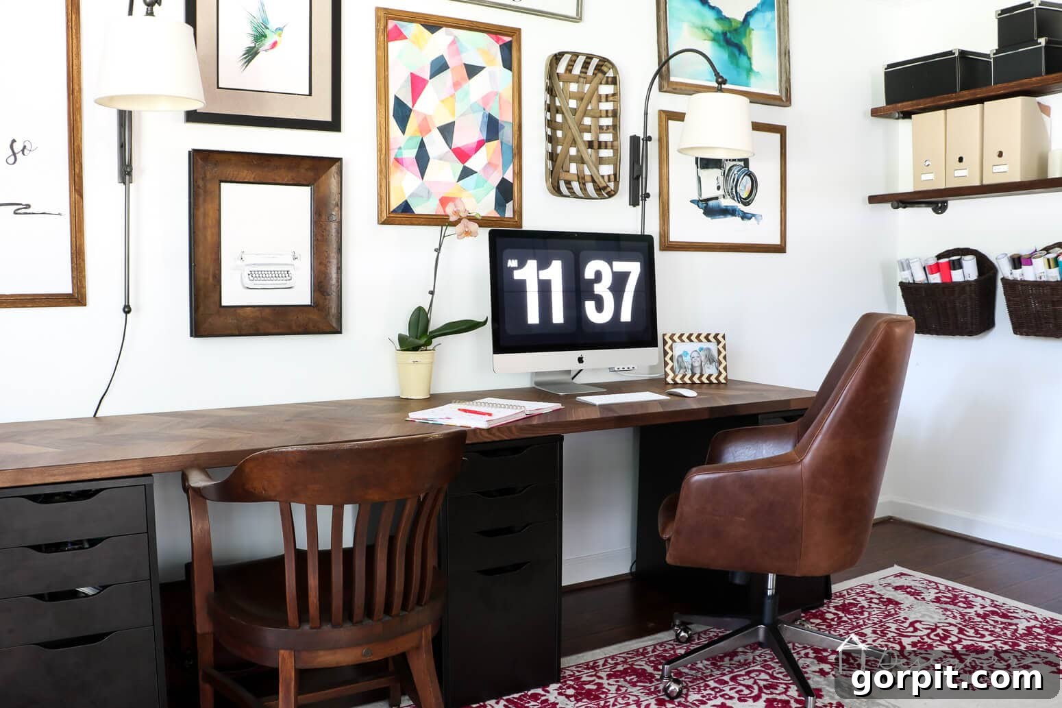 Smart IKEA Desk Upgrades for Less 3 This IKEA desk hack uses a dark wood countertop on top of Alex drawers, a gallery wall and bookshelves.