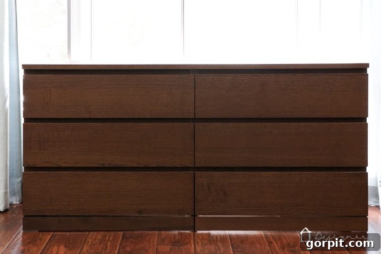 The assembled Ikea Malm dresser in its original, plain brown stained ash veneer finish, before any modifications.