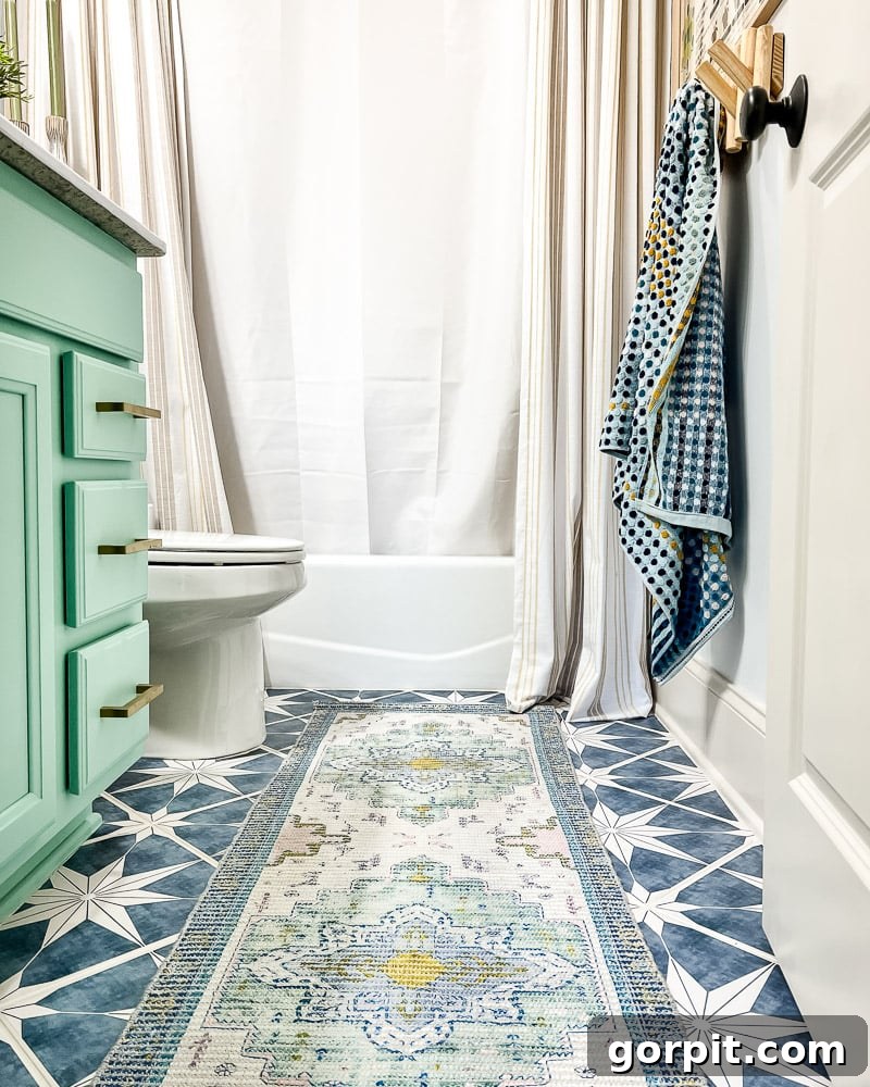 Outdated bathroom tile transformed with affordable tile stickers, showcasing a budget-friendly and stylish renovation.