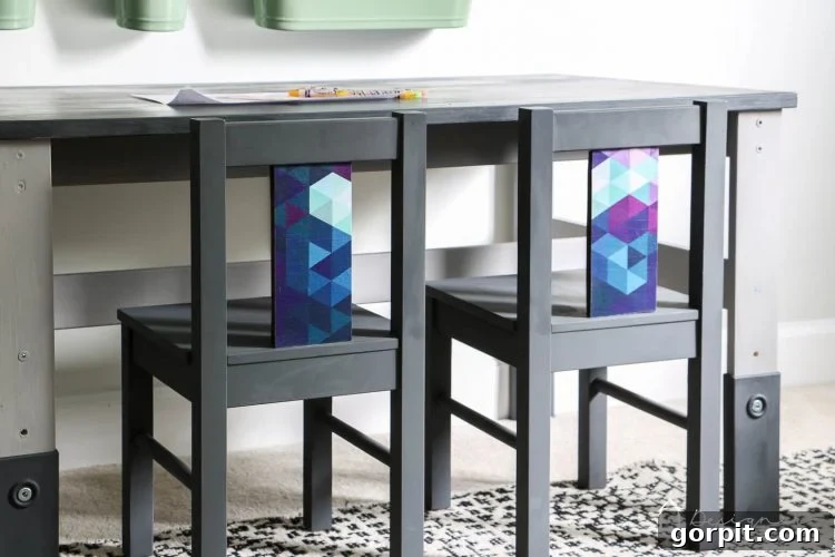 The stunning finished IKEA kids table and chairs makeover, now a stylish focal point in Avery's purple and teal room.
