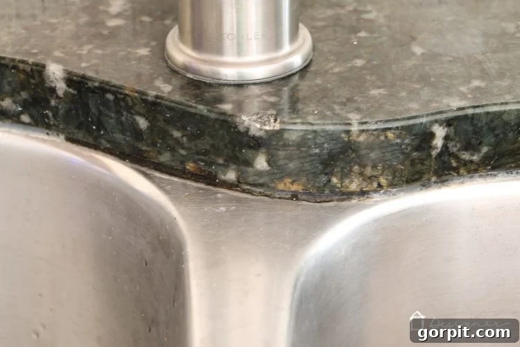 Seamless Caulk Replacement Guide 3 Before and after caulk removal: See the difference a clean seal makes in your kitchen or bathroom.