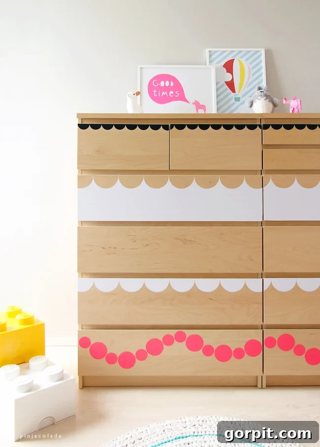 Dresser with geometric vinyl shapes for a modern update