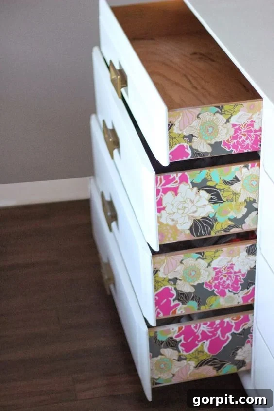 Dresser drawers with beautifully wallpapered sides