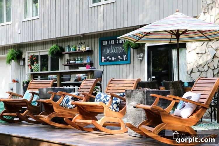 The newly completed DIY deck makeover, showcasing modern outdoor furniture, ample seating, and a stylish dark brown stain. This inviting space is perfect for relaxation and entertaining.