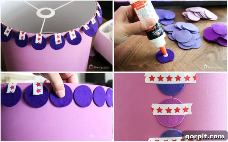 Attaching felt circles to the lampshade with glue and tape guides.