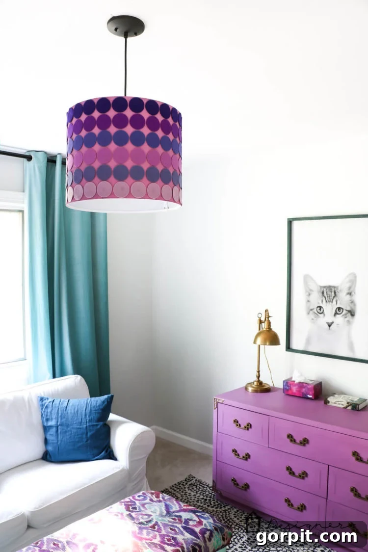 Handmade felt lampshade in ombre purple shades, perfect for a personalized bedroom.