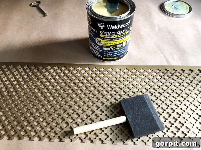 Effortless Door Kick Plate DIY 5 Apply a thin, even layer of DAP Gel Contact Cement to both the back of your kick plate and the designated area on your door, ensuring complete coverage for a strong, screw-free bond.
