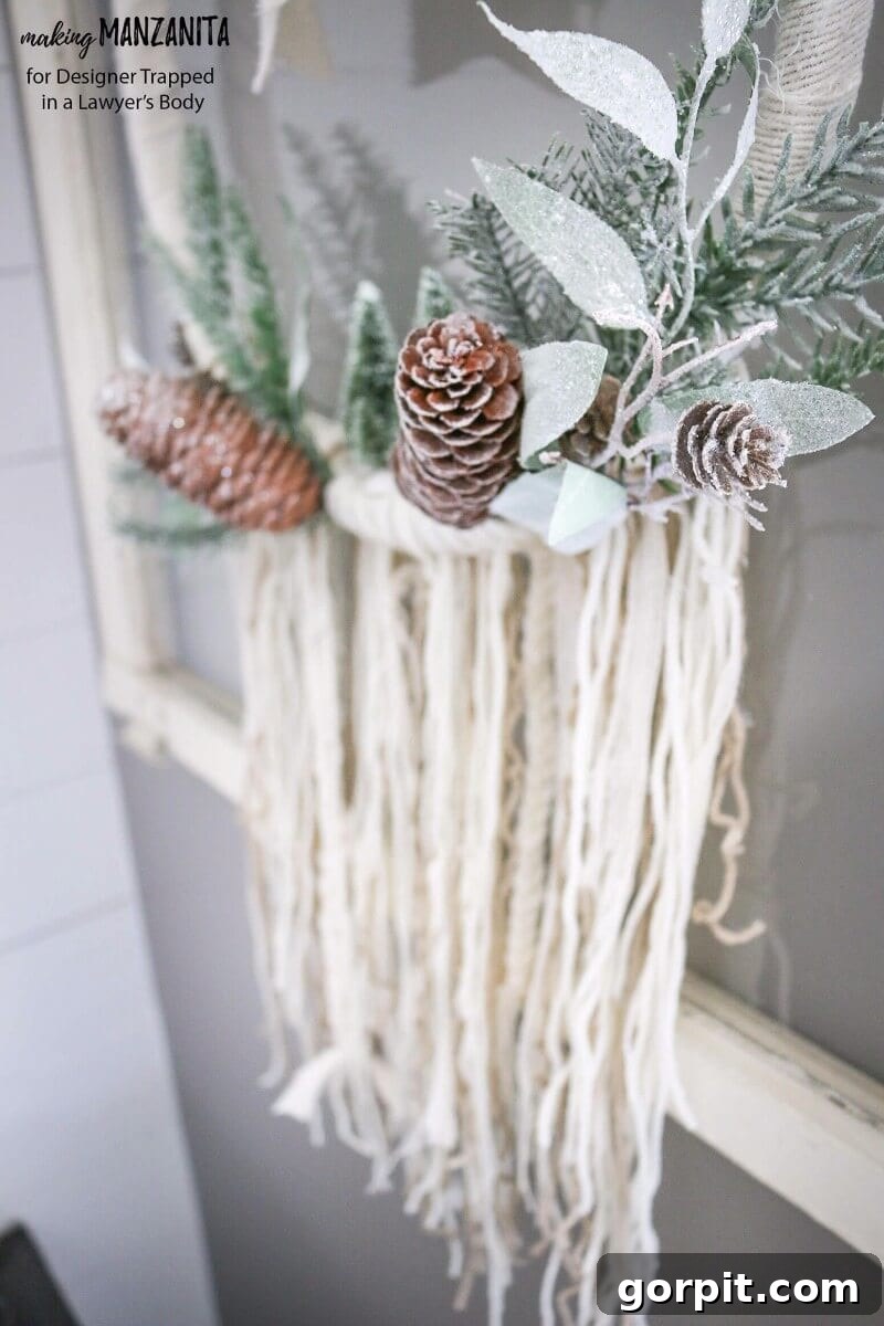 A beautifully crafted DIY Boho Winter Wreath featuring neutral tones and cozy textures
