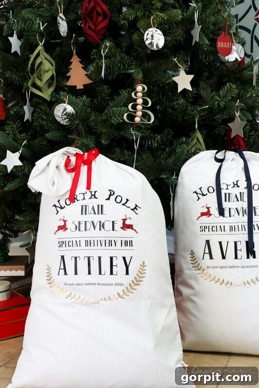 Personalized DIY Santa sacks showcasing individual children's names, nestled under a festive Christmas tree