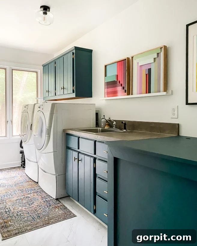 Make Small Rooms Feel Bigger 9 Genius Hacks 15 A fresh laundry room without blinds on the windows is bright and cheery with white walls and deep green cabinets. More sunlight is how to make a small room look bigger.